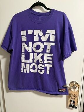 WWE Purple "I'M NOT LIKE MOST" Short Sleeve Tee